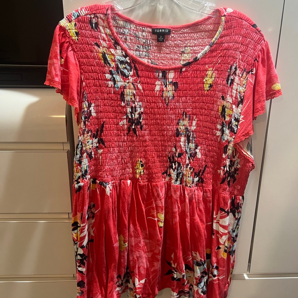 Orange summer shirt with flowers